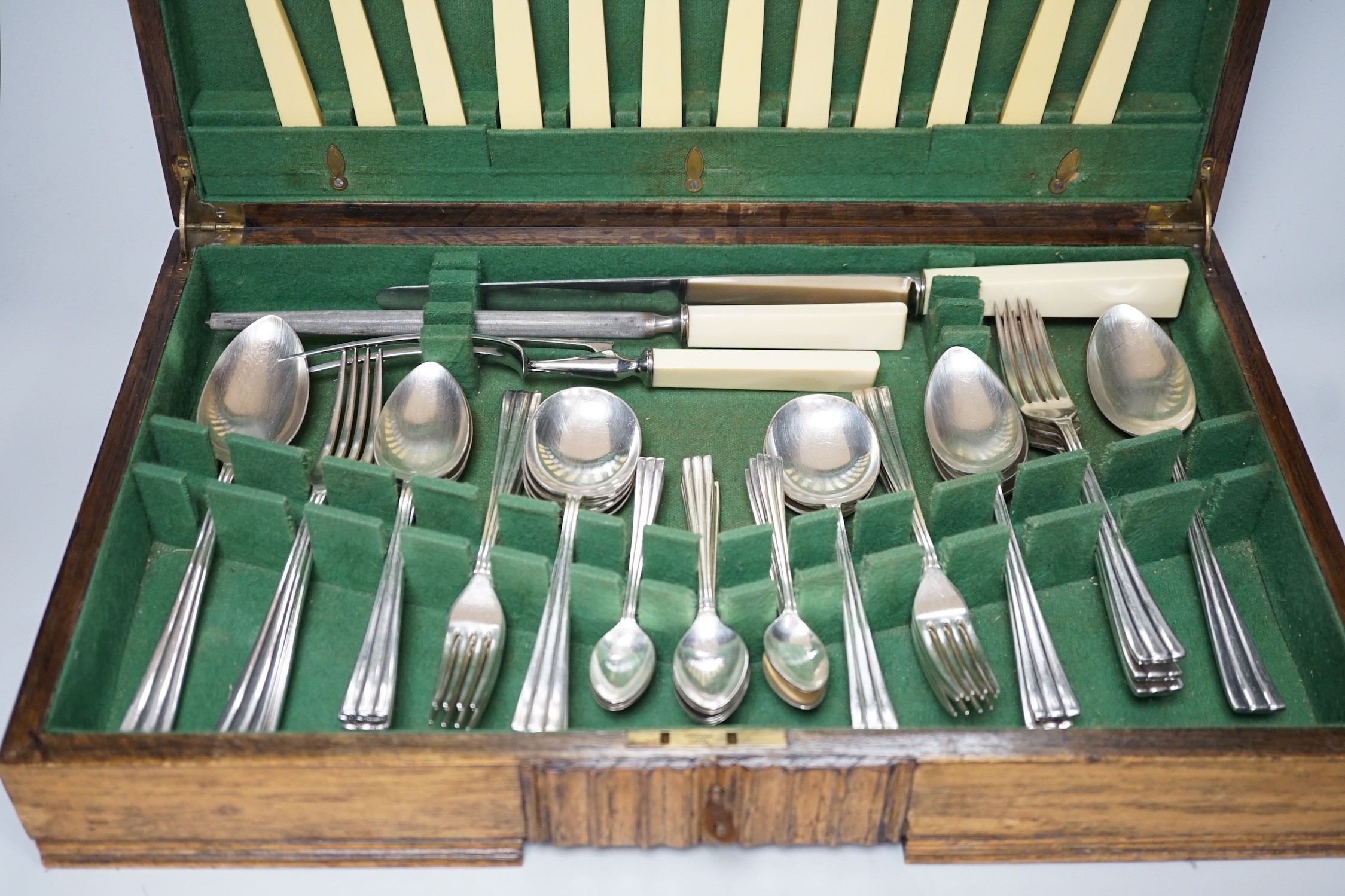 A Harrods plated canteen of cutlery